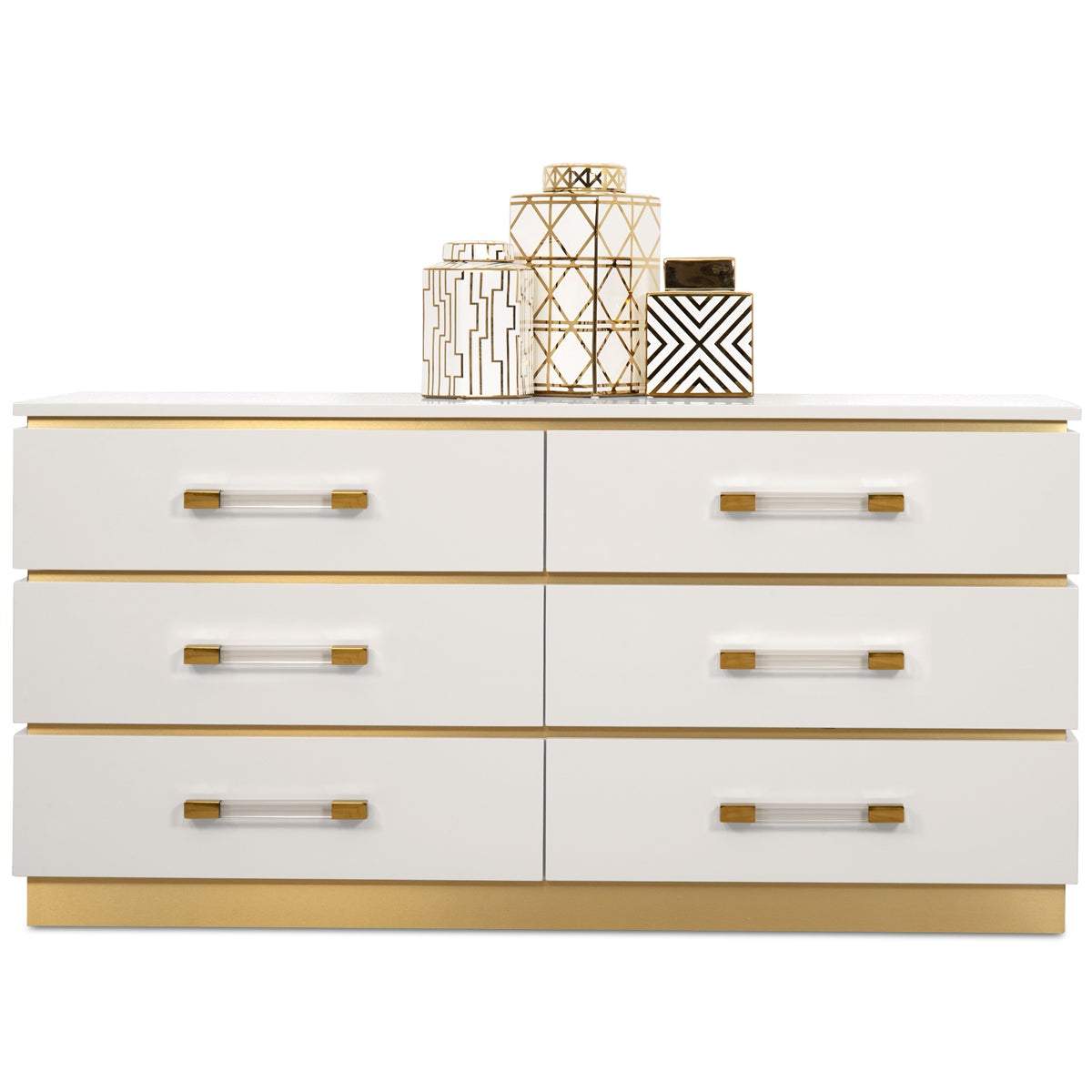 Six-drawer dresser with a brushed brass frame, pedestal base, white drawer fronts and Lucite drawer pulls.