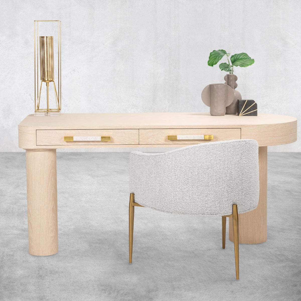 https://modshop1.com/cdn/shop/products/south-shore-oak-cylindrical-desk-2-drawer-marble-shiny-brass-pulls-front-merched-lifestyle_1600x.jpg?v=1648659128